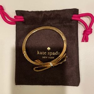 Kate Spade navy and white striped bow bangle.